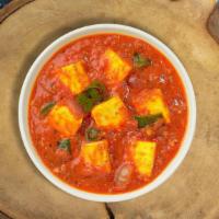 Kadai Paneer Proper · Tender cottage cheese pieces stir fried with bell peppers, onions, & tomatoes in a light gravy