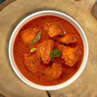 Chicken Curry Murry · Free range chicken breast in a tomato based onion gravy with freshly ground spices.
