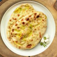 Paneer Naantheless · Freshly baked bread stuffed with cottage cheese cooked in a clay oven