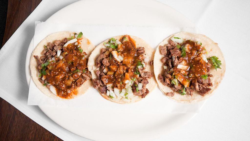 Street Taco · Small corn tortilla with meat, cilantro, onion, and salsa. One taco. Add meat for an additional charge.
