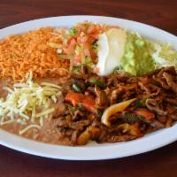 Steak Ranchero · Small beef strips with peppers, tomatoes, and onions.