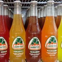 Jarritos · Glass bottled flavored soda.