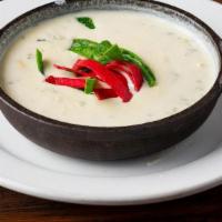 Mi Queso · blend of cheese, tomatoes, onions, and peppers