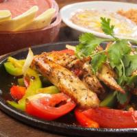 Fajitas · grilled peppers, tomatoes, onions, served with rice, beans, guacamole, sour cream, and your ...