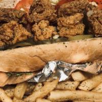 Half & Half Po' Boy Sandwich · 2 choices of Fish, Shrimp or Oysters cooked to perfection filled in a 8