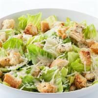 Caesar Salad · Romaine lettuce with savory croutons, fresh Parmesan cheese, and creamy Caesar dressing.
