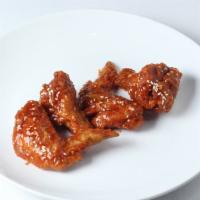 Extra Spicy Hot Wings · Traditional tendered wings tossed in extra spicy hot sauce.