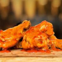  Buffalo Wings · Wings tossed with Buffalo Wings sauce served with your choice of blue cheese or ranch.