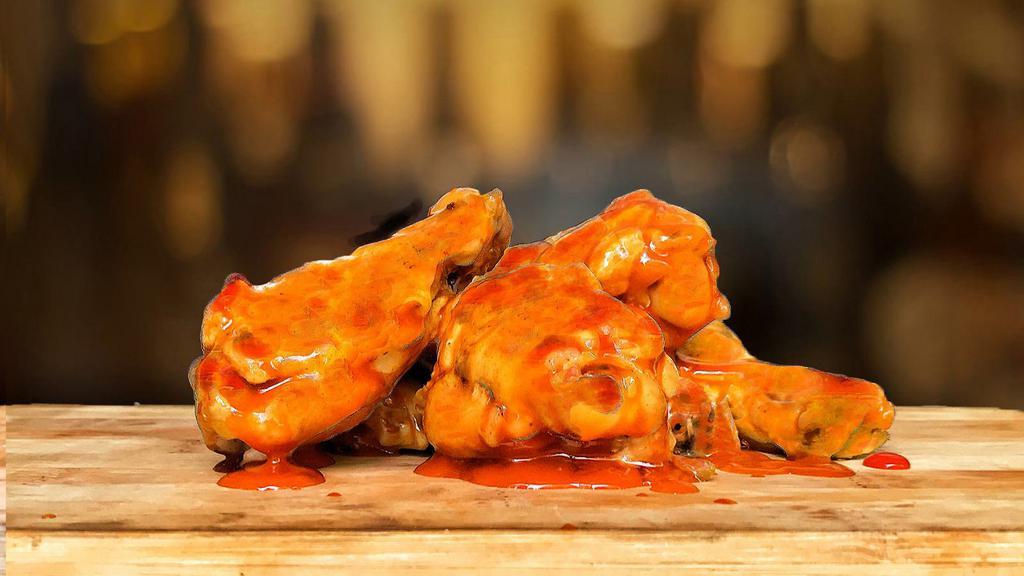  Buffalo Wings · Wings tossed with Buffalo Wings sauce served with your choice of blue cheese or ranch.