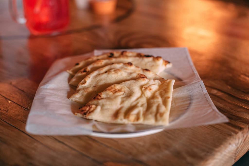 *Toasted Pita · Warm toasted Pita. A perfect companion to any of our Peri Peri Chicken dishes.