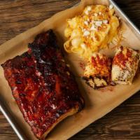 Baby Back Ribs 1/2 Rack · Carnitas fried clutch style or fire grilled