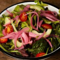 Clutch House Salad · Mixed greens, heirloom tomatoes, cucumber, sliced sweet onion. Choice of honey mustard drizz...