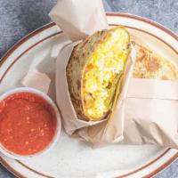 Deluxe Burrito · Three eggs, ham, bacon, cheese, and potato. Comes with salsa.