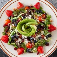 Summer Salad · Mixed greens, avocado, tomato, feta cheese, strawberries, dried cranberries, candied walnut,...