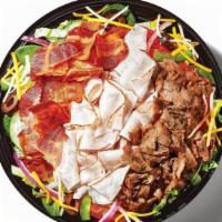 Steak Club (450 Cals) · Our Steak Club sandwich, served in a bowl. Delicious steak, oven roasted turkey and hickory ...
