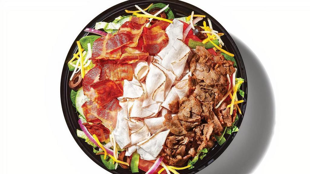 Steak Club (450 Cals) · Our Steak Club sandwich, served in a bowl. Delicious steak, oven roasted turkey and hickory smoked bacon sit atop all your favorite veggies. Dig in.
