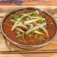Beef Nihari · Slow-cooked beef shanks with aromatic strong spices, lemon and leafy cilantro