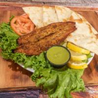 Lahori Fish · Fish fillet marinated in tangy spices, with lemon and herbs. Served with either Zeera Pulao ...