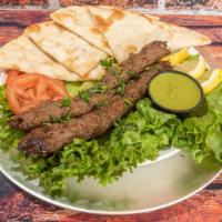 Beef Skewers X2 · Minced beef marinated in a flavorful  traditional seasoning, served with raita