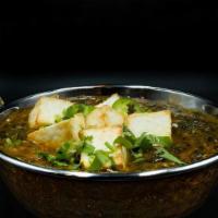 Palak Paneer · Cottage Cheese mixed with a creamy spinach sauce, infused with spices