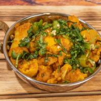 Aloo Gobi · A fusion of potatoes and cauliflower braised in the traditional Lahori way