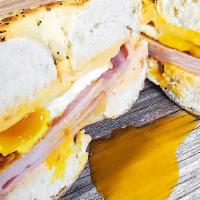 Bagel Breakfast Sandwich · Toasted bagel, egg, choice of meat, and cheese.