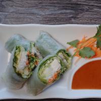 Fresh Spring Rolls · With green leaf, lettuce, carrot, cucumber, cilantro, tofu and vermicelli. Serve with peanut...