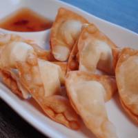 Cheesy Wonton · With carrot, and green onion in cream cheese. Serve with sweet and sour sauce.