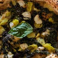 Bianca Pizza · Macadamia ricotta, cashew mozzarella, almond parmesan, rice mozzarella, pepperoncini, rapini...