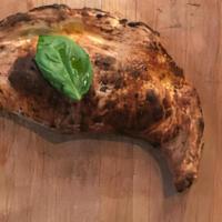 Eggplant Calzone · FRIED EGGPLANT. TOMATO. CASHEW MOZZARELLA. RICE MOZZARELLA. MACADAMIA RICOTTA. ALMOND PARMES...