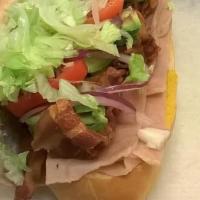 Sub Sandwich · Mayo mustard onions lettuce and tomato.