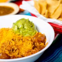 Pork Chile Verde · Rice, beans (refried or de olla), Chile Verde, topped with cheese, side of guacamole