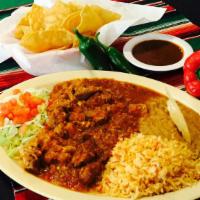 Chile Verde · Seared pork simmered in our unique tomato based chili verde recipe.  Served with rice, beans...
