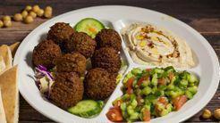 Falafel Plate · 8 falafel balls with hummus & tahini, Israeli salad & pita bread.