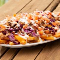 Carnitas Fries · Jackfruit carnitas, Follow your heart cheese, Tomato, Red cabbage, Ranch, Spicy chipotle BBQ...
