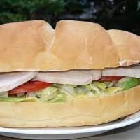 Torta Sandwich · Toasted sourdough roll with choice of meat topped with avocado, onion, jalapeno, lettuce, to...