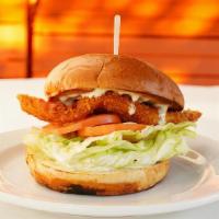 Crispy Organic Chicken Sandwich & Fries · Organic chicken breast, lettuce, tomato, and choose sauce.