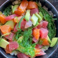 Ahi Poke Bowl · Diced raw tuna, salmon, avocado & seaweed salad served over sushi rice