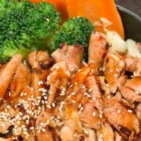 Teriyaki Chicken Bowl · served with white rice and steamed vegetables