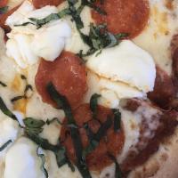 Ricotta Basil - 14 Inch · Pizza sauce, mozzarella, ricotta, basil, pepperoni - 14 Inch