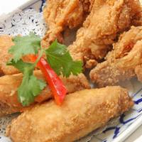 Crispy Golden Wings (6 Pc) · Thai style crispy bone-in chicken wings fried to golden perfection.