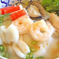 Seafood Noodle Soup · Shrimps, squids, mussel, fish filet, imitation crab, bean sprout, scallion, in clear chicken...