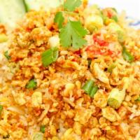 Crab Meat Fried Rice · With egg, onions, green onions, peas, and carrots.
