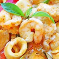 Seafood ￼With Chu Chi Sauce · Stewed Seafood (Shrimp, Fish, Squids, Scallops, and Mussels) in rich and creamy red curry sa...