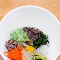 Bibimbap · Steamed rice mixed with vegetable, beef, egg with spicy sauce.
Served with rice and one set ...