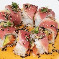 In & Out Roll (8) · Spicy tuna, avocado, cucumber, seared tuna, and green onion.
