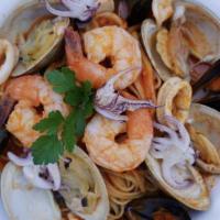 Mafaldine Di Mare · Mafaldine pasta, mussels, clams, calamari, and shrimp in a Pomodoro sauce.