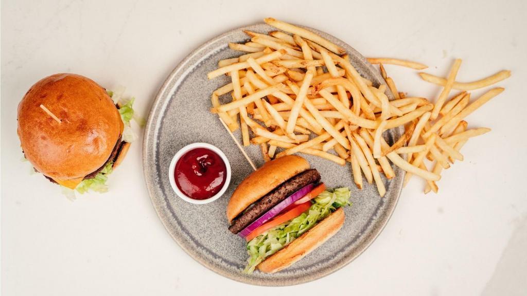 Impossible Burger (Vegetarian) · Brioche bun, all the groceries, impossible patty, secret sauce.