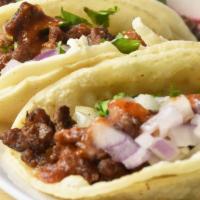 Taco Pastor	 · Folded tortilla with a variety of fillings such as meat or beans.