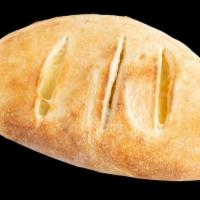 Calzone · Mozzarella & Ricotta rolled in Dough. Comes with Marinara Sauce. Add Toppings +$1.50.